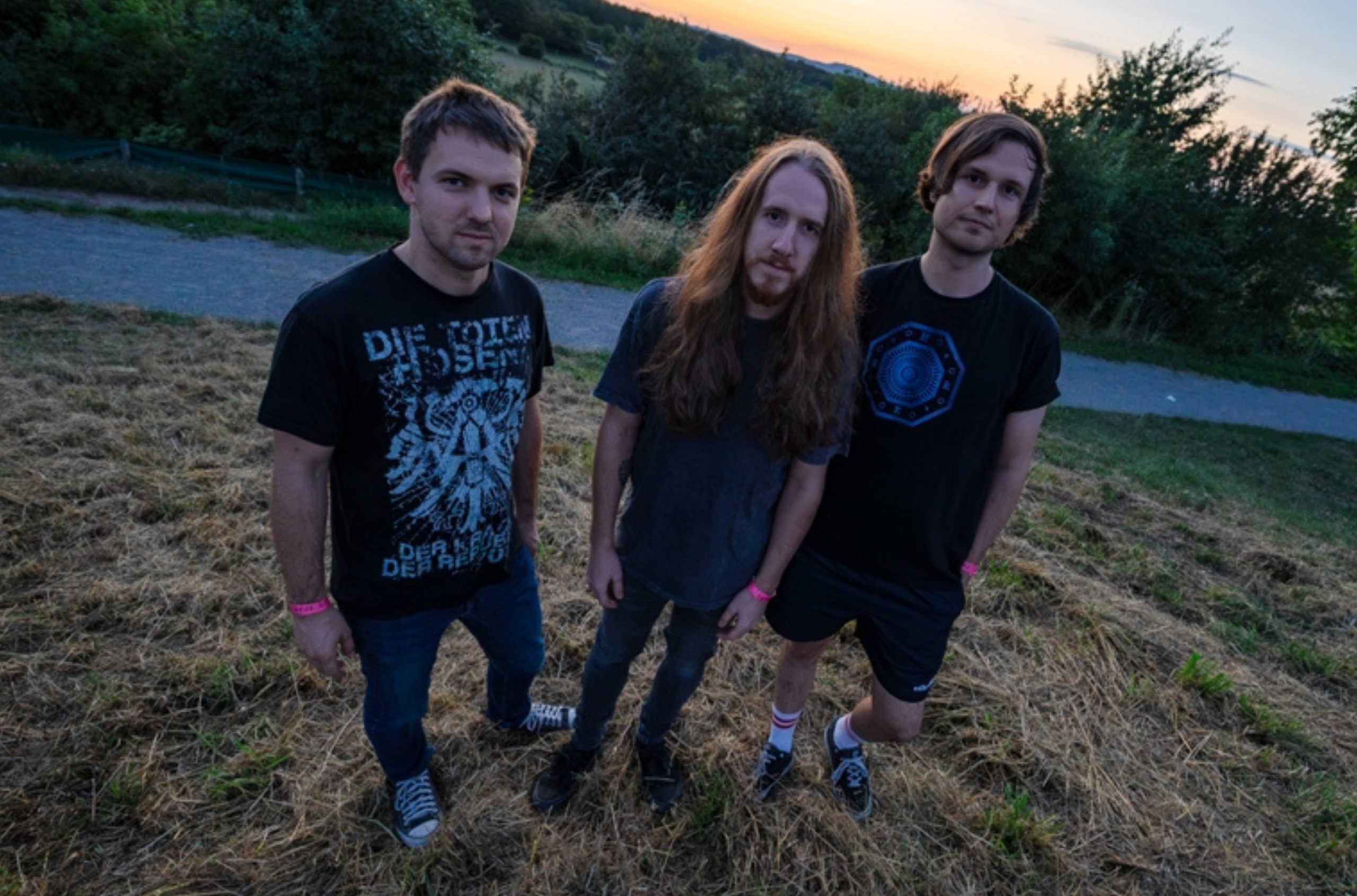 Bandfoto Lowlife Chambers vor einem Sonnenuntergang.